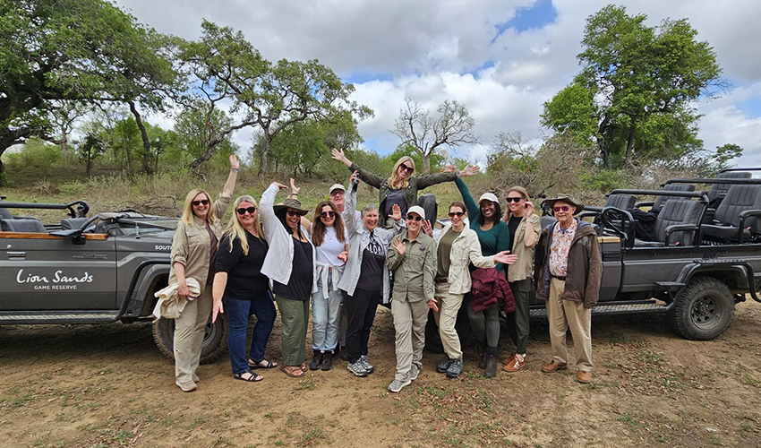 A group enjoying a private game drive at Lion Sands private reserve.